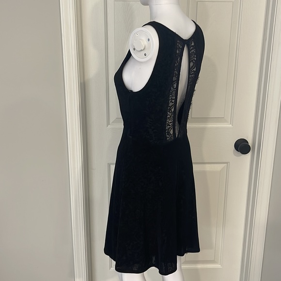 Free People Dresses & Skirts - Free People Sexy Lined Sheer Print and Open Lace Panel Back Black Mini Dress-S